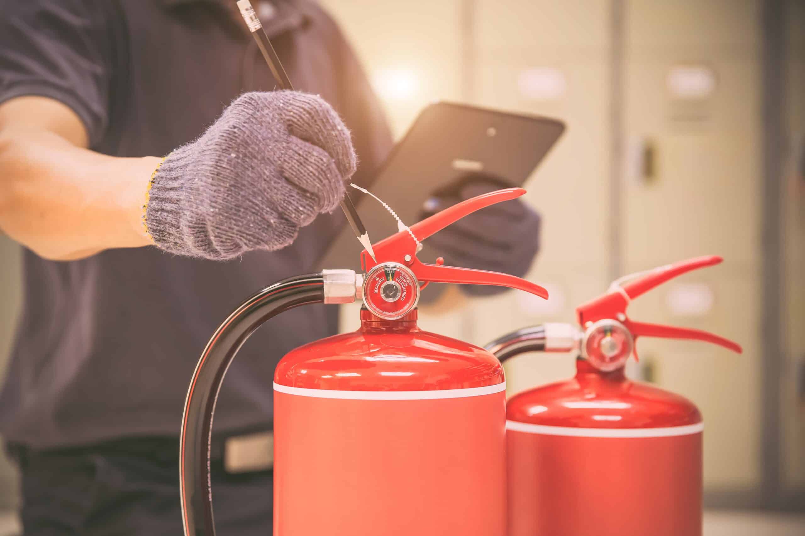 Fire,Extinguisher,,Engineer,Inspection,Checking,Pressure,Gauge,Level,Fire,Extinguishers