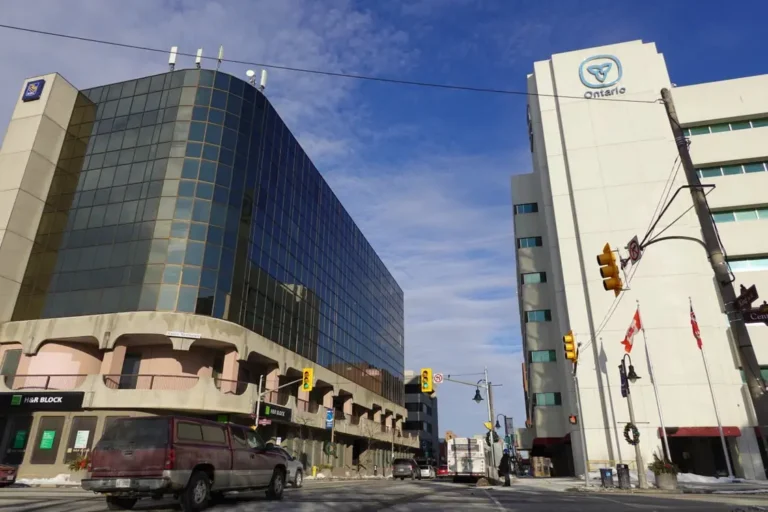 The image shows the intersection of King Street West and Centre Street in downtown Oshawa, Ontario, Canada